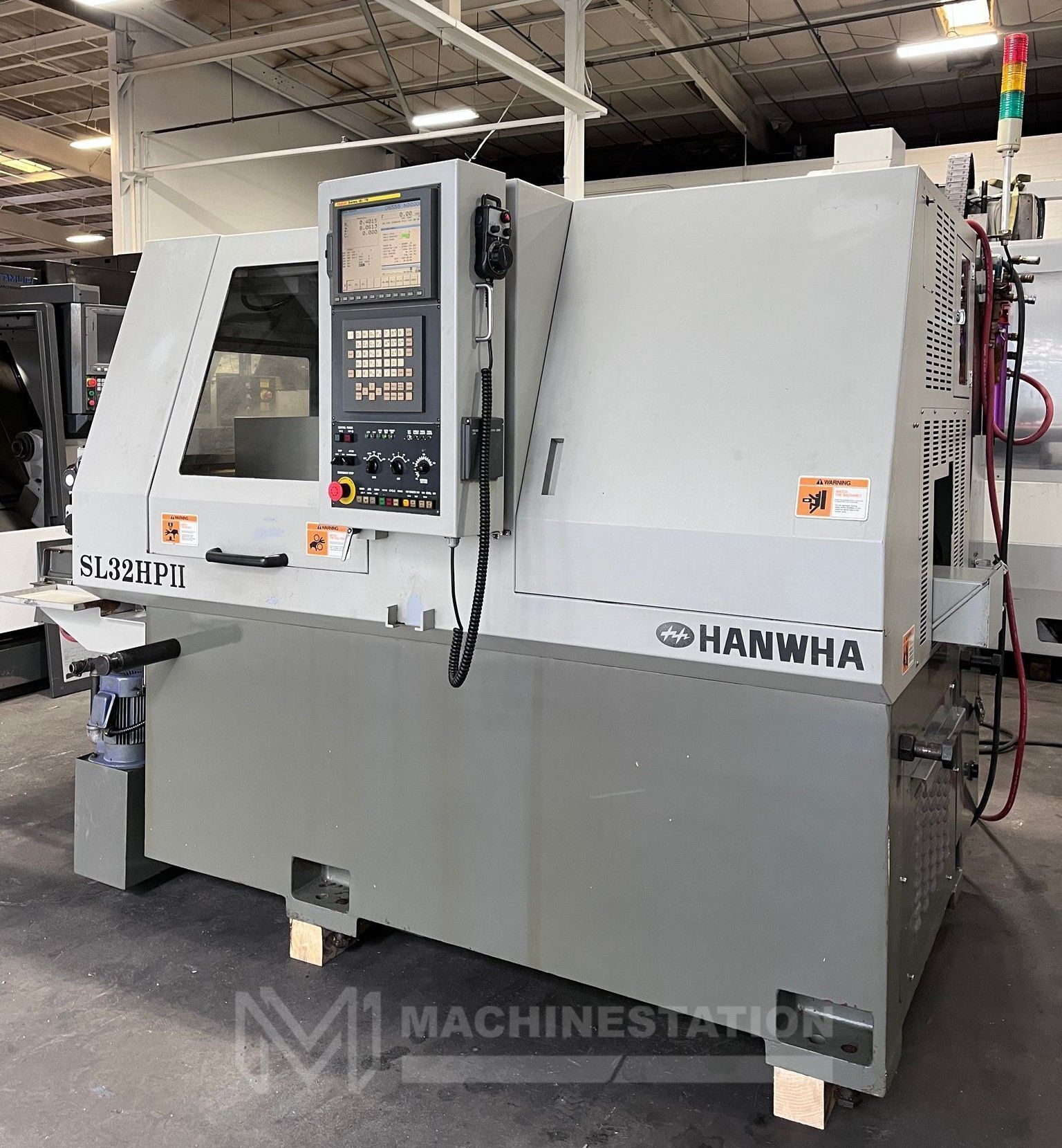 Hanwha SL32HPII CNC Swiss Type Automatic Lathe - Bar Feeder 2