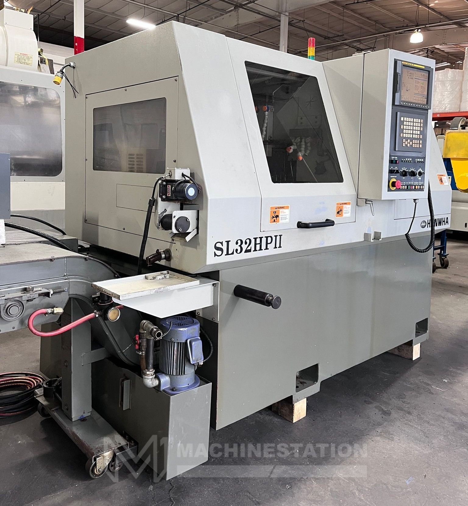 Hanwha SL32HPII CNC Swiss Type Automatic Lathe - Bar Feeder 1