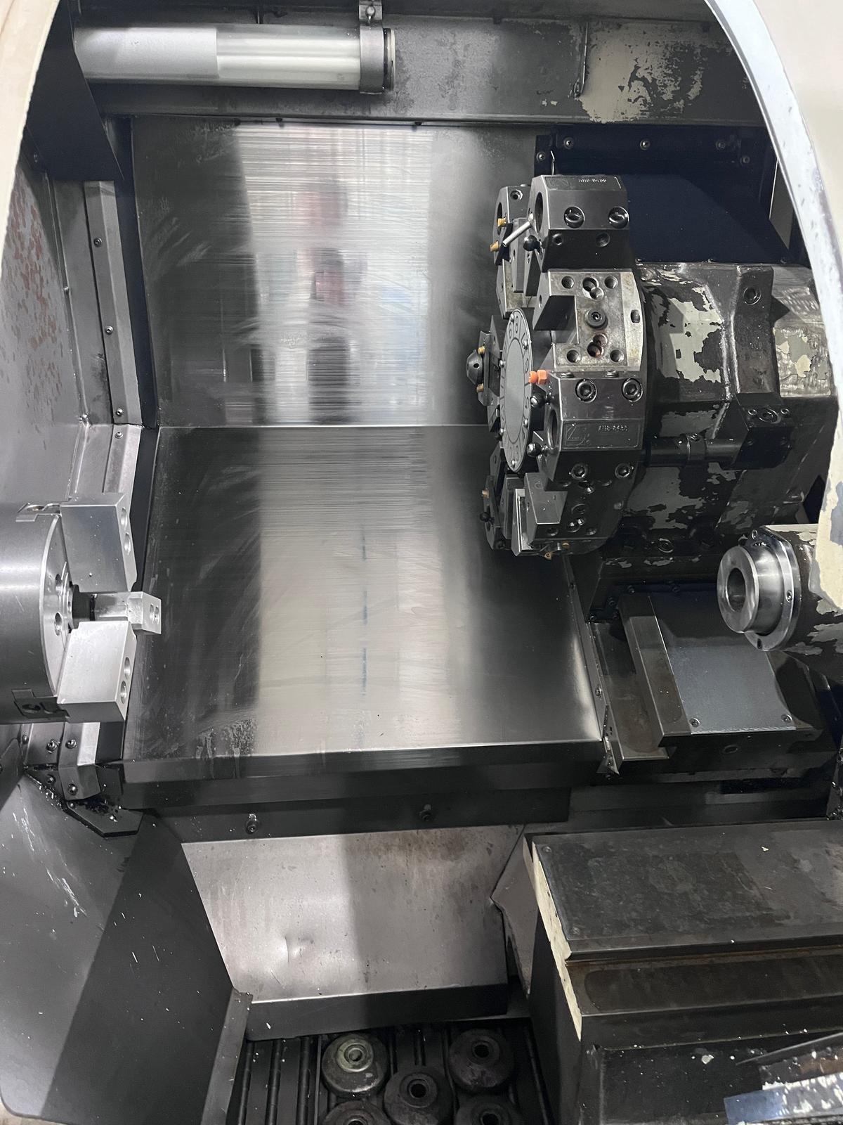 Buy Used Okuma Crown L1060 762E CNC Turning Center For Precision