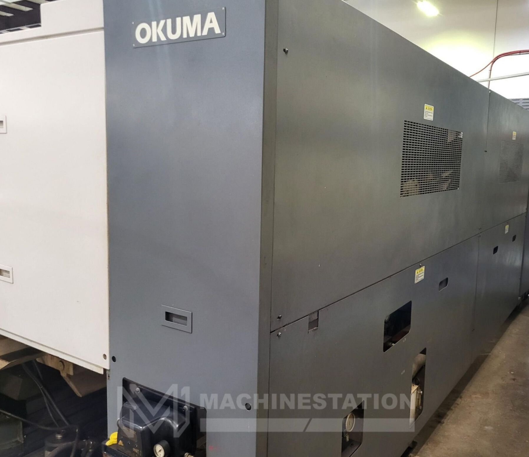 Used Okuma LB-35II CNC Turning Center Long Bed Lathe (2005)