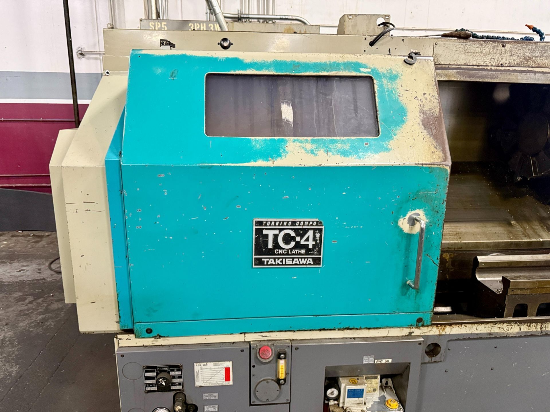 TAKISAWA TC-4 CNC TURNING CENTER - 2000 MM LONG BED 4