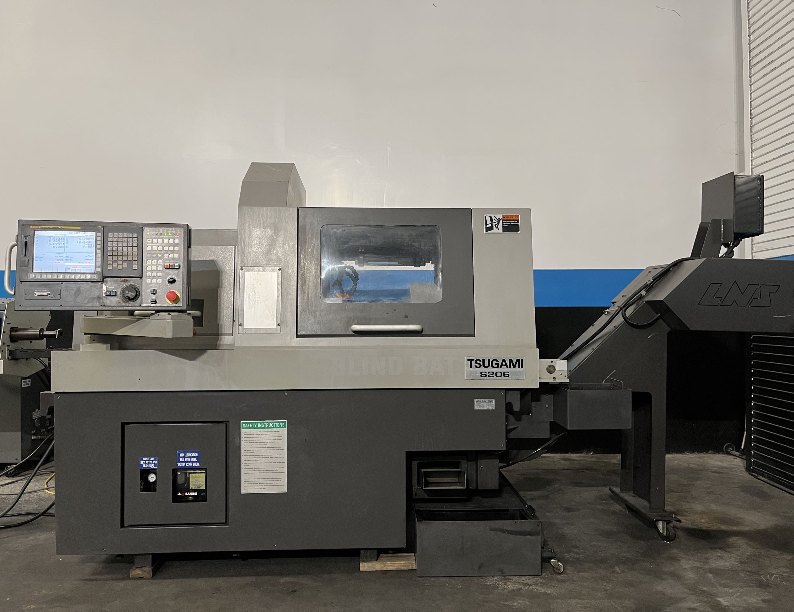 Tsugami S206 CNC Swiss Type Automatic Lathe - Bar Feeder 1