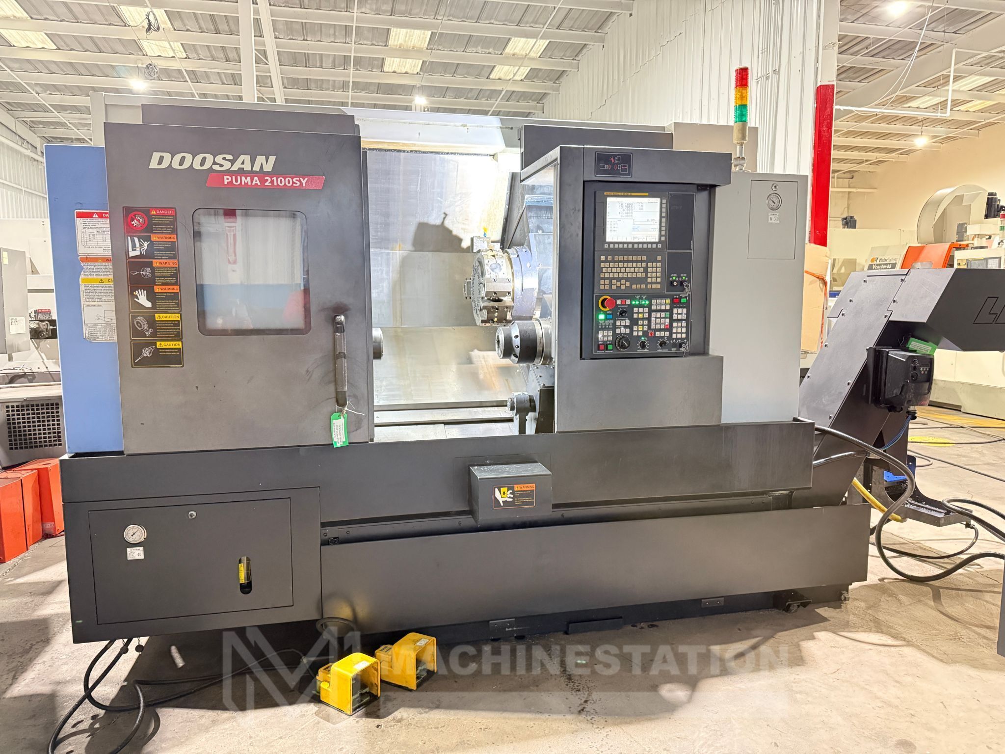 Doosan Puma 2100SY CNC Turning Center - Sub Spindle Y Axis Bar Feeder Lathe 0