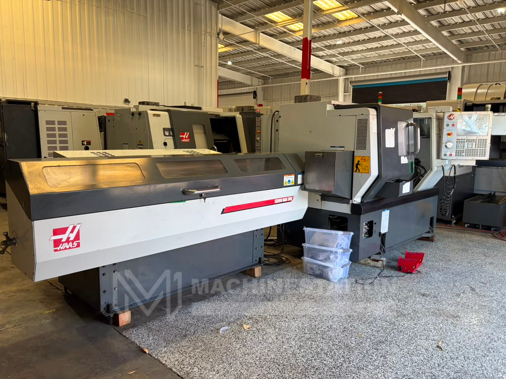 Haas ST-10 CNC Turning Center - Lathe W/ Bar Feeder 1